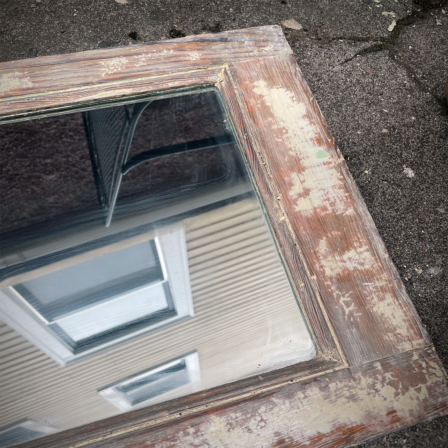 The door of a medicine cabinet, in a state of distress