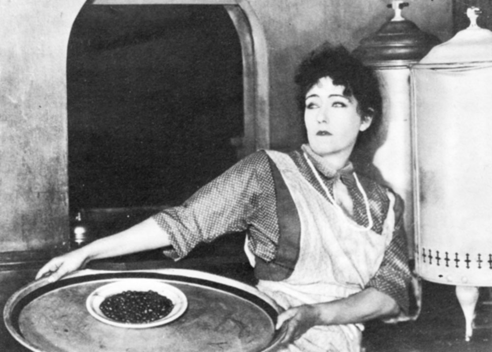 Gloria Swanson and a plate of beans, from Star Struck