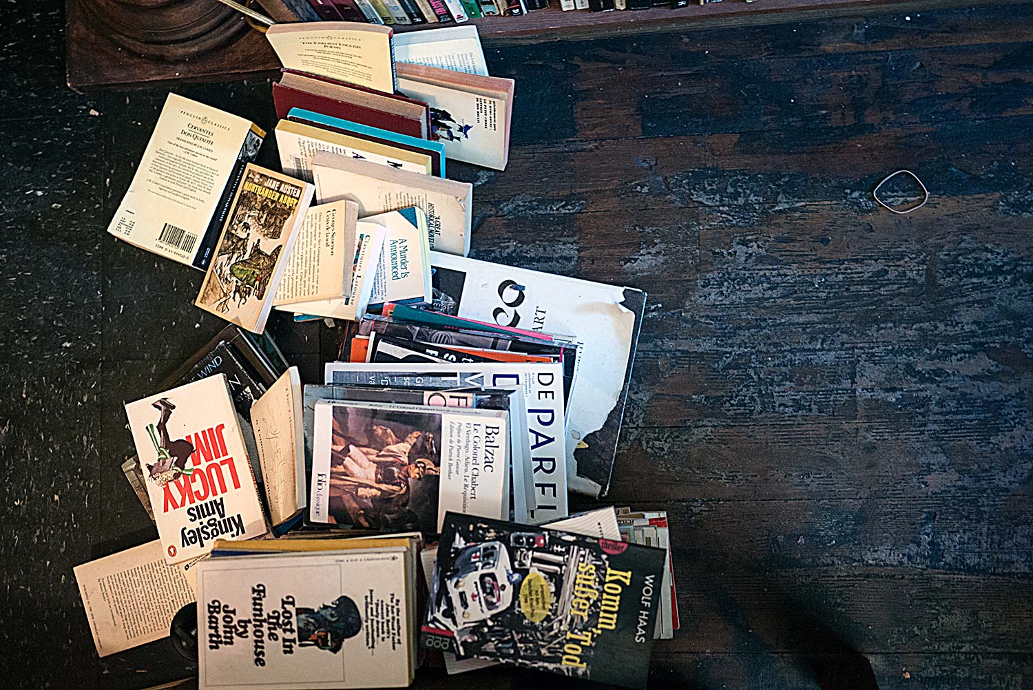 Books in a fallen stack upon the floor