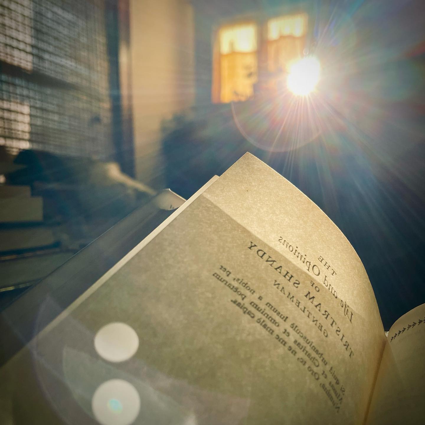 a picture of a book and some dramatic sunlight